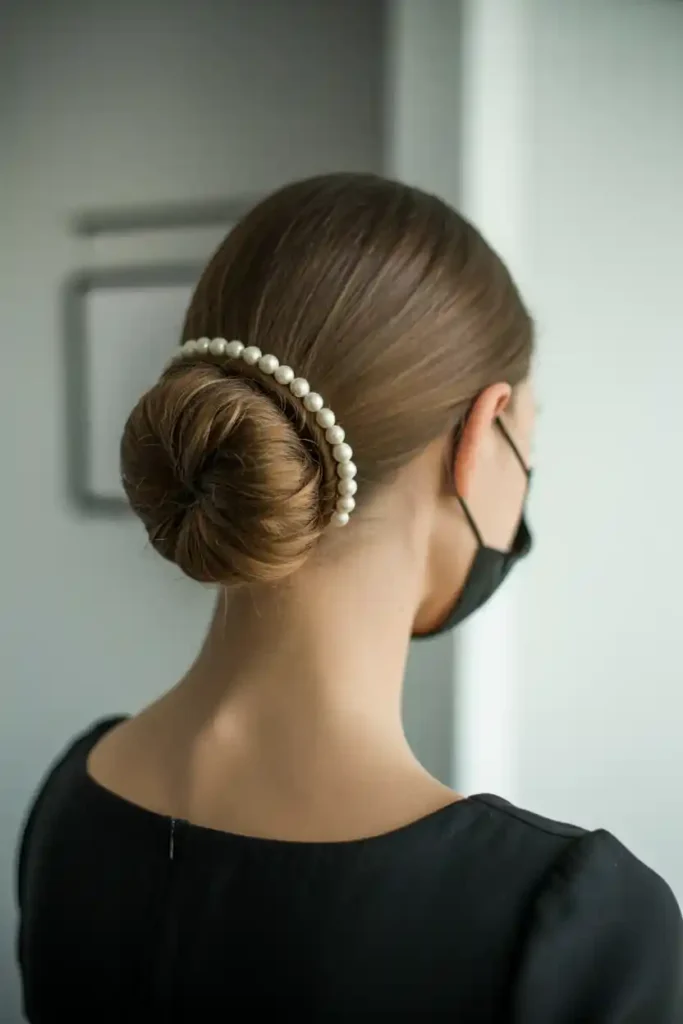 Sleek Low Chignon for All-Day Polish