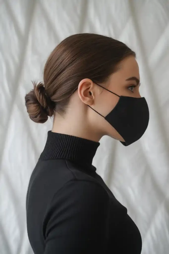 Side Swept Low Knot with Shine Spray