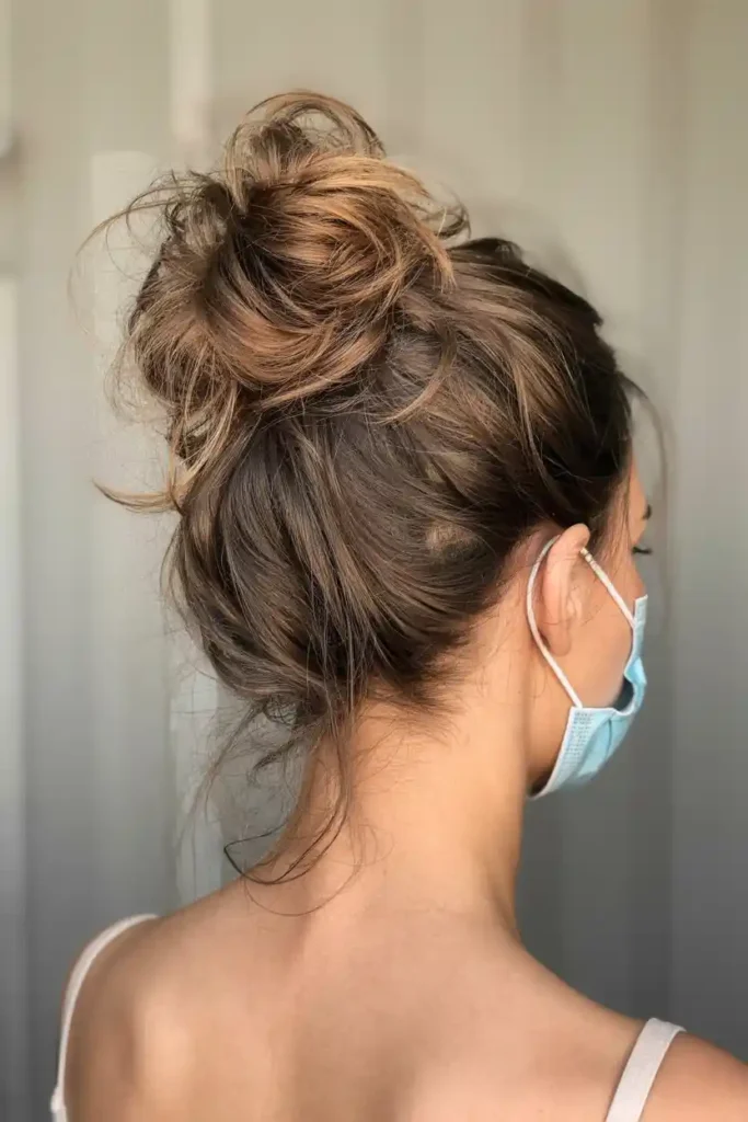 Chic Messy Bun with Texture Spray